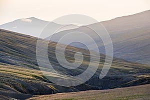 Sloping hills at sunset in northern Iceland