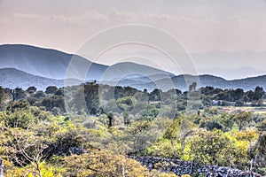 Church on a hill surrounded by Hillsides of Guadalcazar, Mexico photo