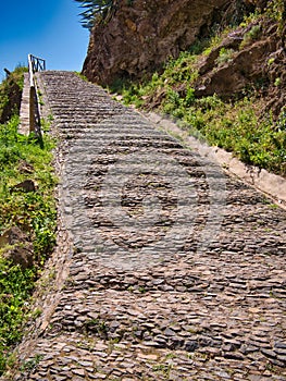 Sloping stone steps on a walking trail below the cable car to the Botanical Gardens in Monte, above Funchal in Madeira