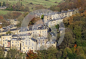 Sloping street and tall houses in hebden bridge