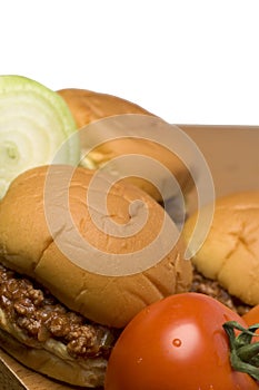 Sloppy joe sandwich with tomatoes onions photo