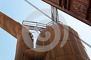 Sloss Furnaces National Historic Landmark, Birmingham Alabama USA, large riveted tank and pipe, open slat catwalks