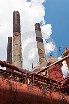 Sloss Furnaces National Historic Landmark, Birmingham Alabama USA, smoke stacks and rusting pipes industrial site