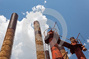 Sloss Furnaces National Historic Landmark, Birmingham Alabama USA, smokestacks and rusted industrial structures reaching skyward,