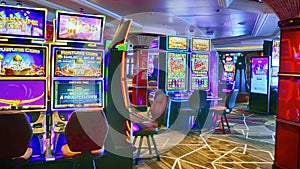 Slot machines in  casino onboard a cruise ship i