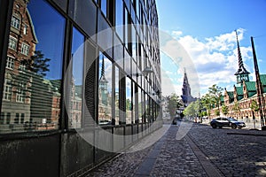 Slotsholmen, view with the window reflection on a famous Old Stock Exchange -BÃÆÃÂ¸rsen. The tower with 