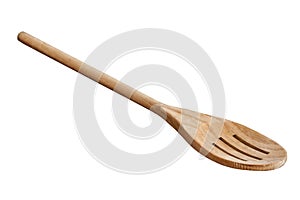 Slotted wooden spoon on white