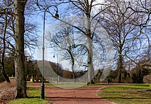 Slottsparken, a park in MalmÃÂ¶, Sweden, during early spring with sunlight photo