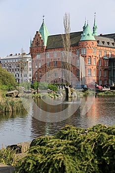 Slottsparken park pond and city library building, Malmo, Sweden photo