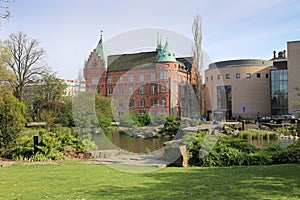 Slottsparken park pond and city library building, Malmo, Sweden photo