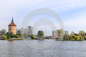 Slottsparken park pond and old tower panorama, Malmo, Sweden photo