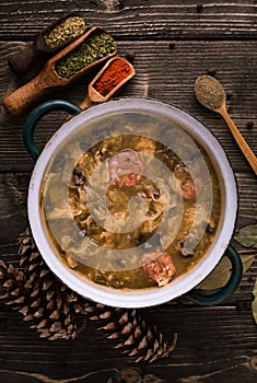 Slovak christmas cabbage soup with mushrooms on natural background.