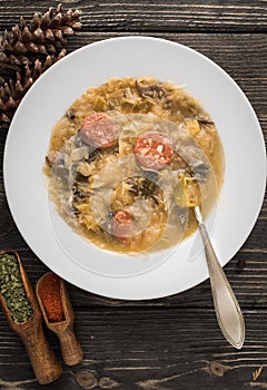 Slovak christmas cabbage soup with mushrooms on natural background.