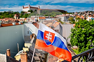 Slovak flag on Bratislava city background