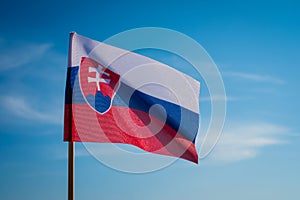 Slovak flag waving in wind and sunlight