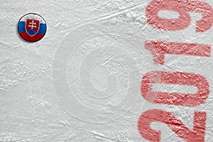 Slovak hockey puck on ice