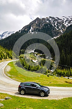 Slovakia, April 24, 2019: Kia Sportage stands on the side of a mountain road photo