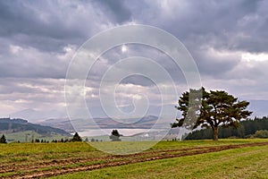 Slovakia autumn cloudy morning panorama. Rural fall scene