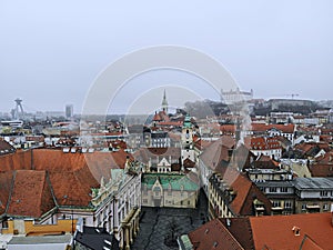 Slovakia, Bratislava. Historical centre. Aerial view from above, created by drone. Foggy day town landscape, travel photography.