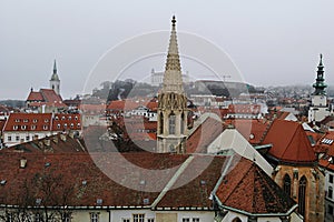 Slovakia, Bratislava. Historical old city centre. Aerial view from above, created by drone. Foggy day town landscape, travel