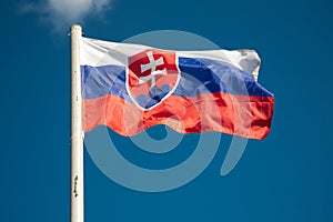 Slovakia flag against blue sky