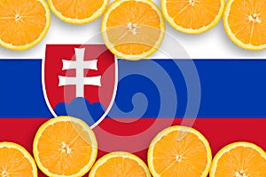 Slovakia flag in citrus fruit slices horizontal frame
