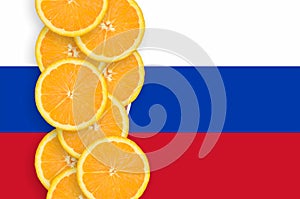 Slovakia flag and citrus fruit slices vertical row