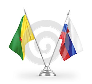 Slovakia and French Guiana table flags isolated on white 3D rendering