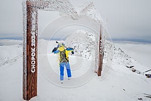 Slovakia, Jasna - January 31, 2022: woman skier on the top of the chopok mountain
