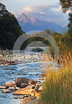 Slovakia mountain stream Bela with Tatra peak Krivan in background photo