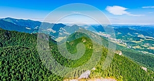 Slovakia national parkland Mala Fatra - view from Maly Rozsutec mountain to nearby hills and valleys. Sunny summer day, tourism