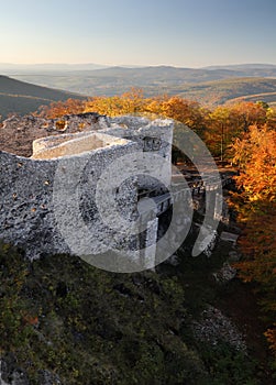 Slovakia - ruin of castle Uhrovec at nice autumn sunset landscape