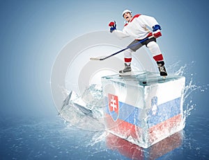 Slovakia - Slovenia game. Spunky hockey player on ice cube