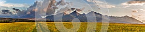 Slovakia - Tatras in the early morning. Clouds above the mountains.