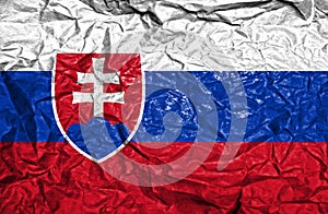 Slovensko vintage vlajka na starom pokrčenom papieri pozadí