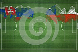 Slovensko vs Čile futbalový zápas, národné farby, národné vlajky, futbalové ihrisko, futbalový zápas, kopírovať priestor