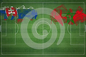 Slovensko vs Maroko futbalový zápas, národné farby, národné vlajky, futbalové ihrisko, futbalový zápas, kopírovať priestor