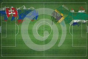 Slovensko vs Juhoafrická republika futbalový zápas, národné farby, národné vlajky, futbalové ihrisko, futbalový zápas, kopírovať priestor