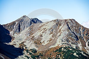 Slovakian Tatra mountain high peaks on the blue sky background