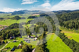 Slovakian town on forested hillside in summer