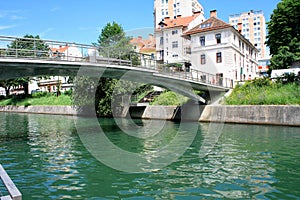 Slovenian capital Ljubljana with small bridge over Ljubljanica r