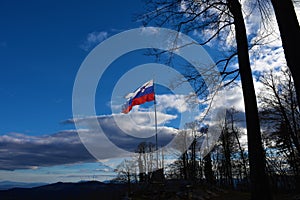 Slovenian flag at the top of Ostri vrh near Grosuplje