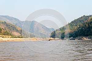 Slow boat cruise on the Mekong River. Popular tourist adventure trip by slow boat from Huay Xai to Luang Prabang.