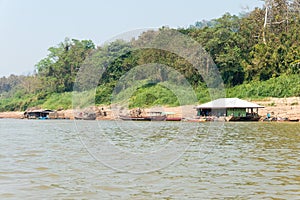 Slow boat cruise on the Mekong River. Popular tourist adventure trip by slow boat from Huay Xai to Luang Prabang.