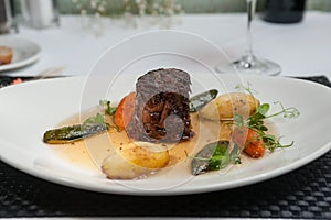 Slow braised sticky beef in a consomme