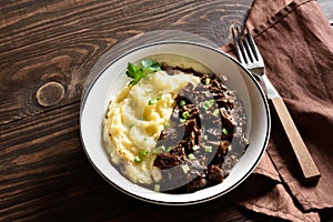 Slow cooked beef with mashed potatoes