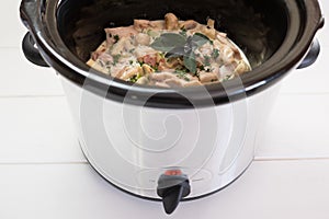 Slow cooker crockpot meal with chicken and herbs