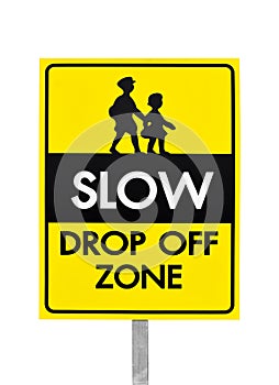 Slow down drop off zone warning yellow banner traffic sign with pole at the school