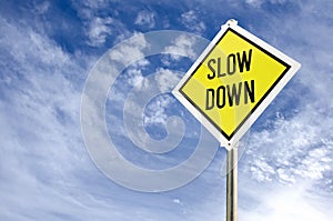 Slow Down road sign