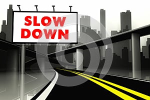 Slow down road sign on highway in big city